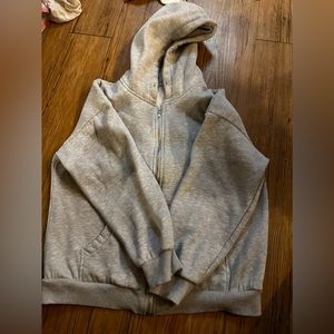 Grey zip up hoodie, this is a kinda thicker hoodie